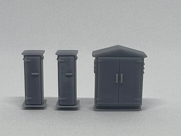 Relay boxes with one large pitched roof box and two small boxes, model railway trackside detail